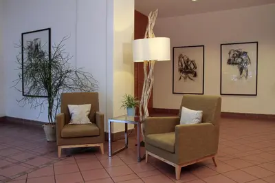 Ein Sitzbereich in der Unterkunft Hotel Deutscher Hof