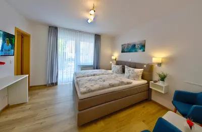 Ein Bett oder Betten in einem Zimmer der Unterkunft Ferienweingut Klaus Thiesen Gästezimmer und Apartments
