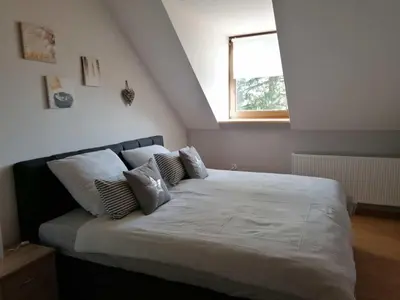 Ein Bett oder Betten in einem Zimmer der Unterkunft Knoofs