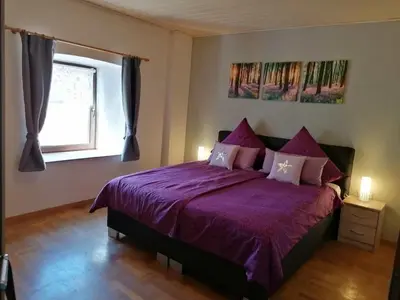 Ein Bett oder Betten in einem Zimmer der Unterkunft Knoofs