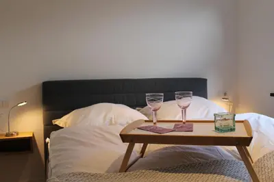 Ein Bett oder Betten in einem Zimmer der Unterkunft Ferienwohnung am Pommerbach