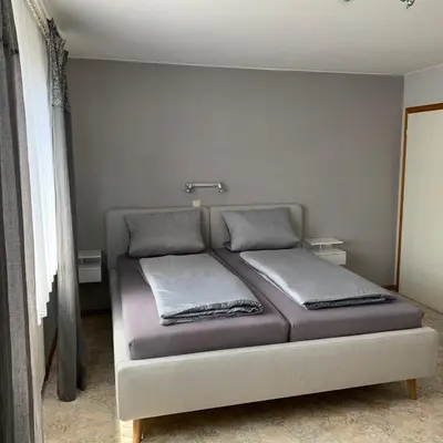 Ein Bett oder Betten in einem Zimmer der Unterkunft Weingut J. A. Meyer
