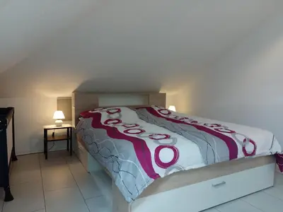 Ein Bett oder Betten in einem Zimmer der Unterkunft FeWo Nala II