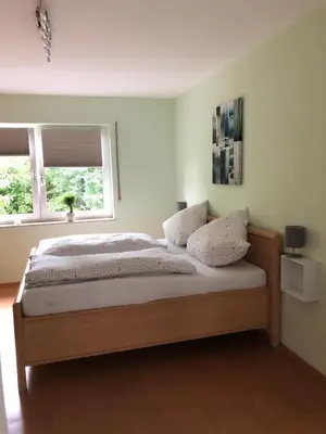 Ein Bett oder Betten in einem Zimmer der Unterkunft Ferienwohnung Zenzen