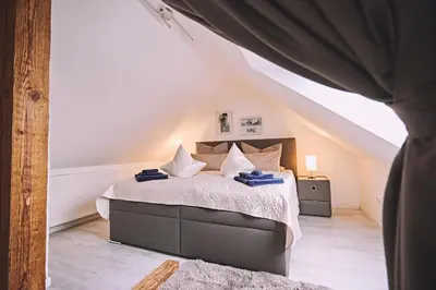 Ein Bett oder Betten in einem Zimmer der Unterkunft Bildstein's 