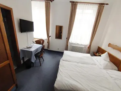 Ein Bett oder Betten in einem Zimmer der Unterkunft Berg´s Backpacker