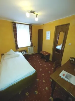 Ein Bett oder Betten in einem Zimmer der Unterkunft Berg´s Backpacker