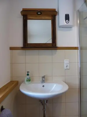 Ein Badezimmer in der Unterkunft Haus Schritte