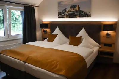 Ein Bett oder Betten in einem Zimmer der Unterkunft Hotel-Restaurant Zur Traube