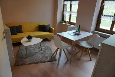 Ein Sitzbereich in der Unterkunft Weingut Göbel-Schausten