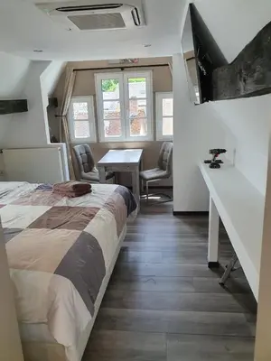 Ein Bett oder Betten in einem Zimmer der Unterkunft Das Herzchen von Cochem