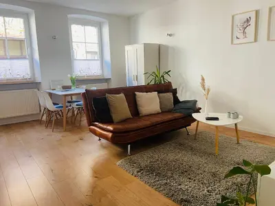 Ein Sitzbereich in der Unterkunft Ferienwohnung Zur Alten Schmiede