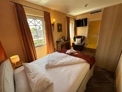 Ein Bett oder Betten in einem Zimmer der Unterkunft Hotel Weisser Bär