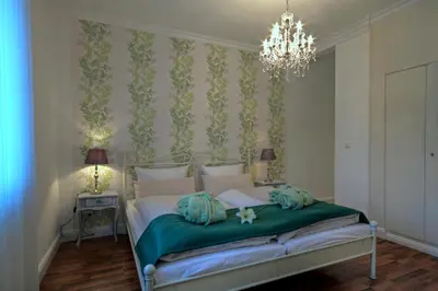 Ein Bett oder Betten in einem Zimmer der Unterkunft Hotel Zum Goldenen Stern