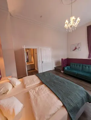 Ein Bett oder Betten in einem Zimmer der Unterkunft Weinhotel St. Stephanus