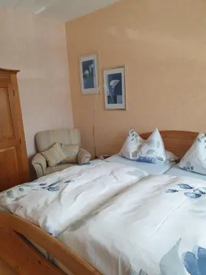 Ein Bett oder Betten in einem Zimmer der Unterkunft Ferienwohnung Thönnes