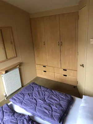Ein Bett oder Betten in einem Zimmer der Unterkunft Ferienhaus Chilllout Chalets Daun-Kradenbach
