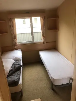 Ein Bett oder Betten in einem Zimmer der Unterkunft Ferienhaus Chilllout Chalets Daun-Kradenbach