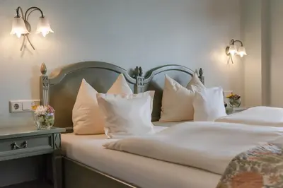 Ein Bett oder Betten in einem Zimmer der Unterkunft Landhaus Sonnenhof