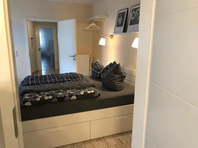Ein Bett oder Betten in einem Zimmer der Unterkunft Ferienwohnung im Zentrum von Winningen