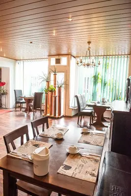 Ein Sitzbereich in der Unterkunft Neubert`s Gasthaus am Rhein