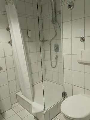 Ein Badezimmer in der Unterkunft Paulin Hotel Trier