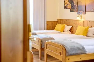 Ein Bett oder Betten in einem Zimmer der Unterkunft Airport-Hotel Fortuna