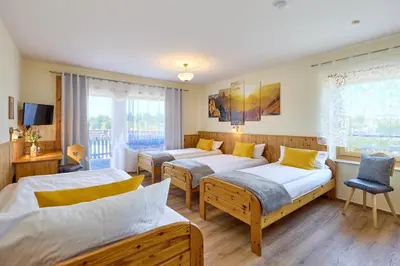 Ein Bett oder Betten in einem Zimmer der Unterkunft Airport-Hotel Fortuna
