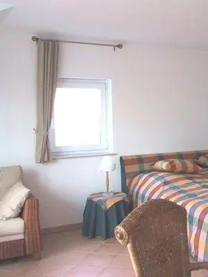 Ein Bett oder Betten in einem Zimmer der Unterkunft Weingut Fries