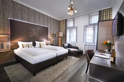 Ein Bett oder Betten in einem Zimmer der Unterkunft Hotel am Markt Bacharach
