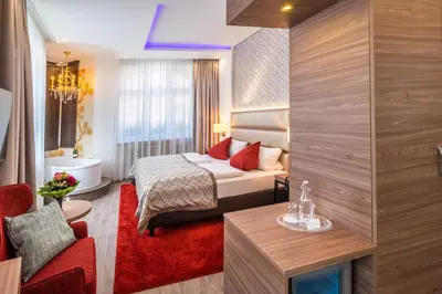 Ein Bett oder Betten in einem Zimmer der Unterkunft Hotel am Markt Bacharach