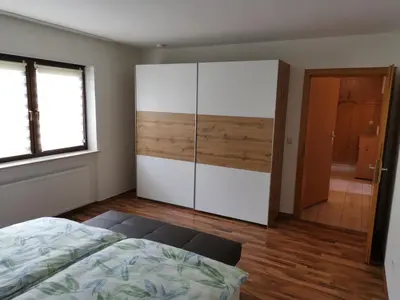 Ein Bett oder Betten in einem Zimmer der Unterkunft Ferienwohnung Moselblick