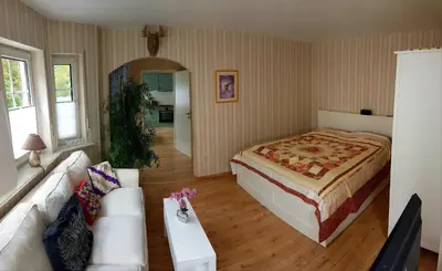 Ein Bett oder Betten in einem Zimmer der Unterkunft Zum Bachhexje