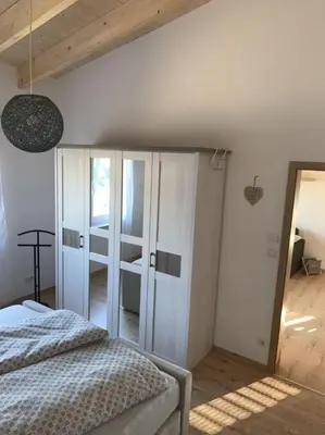 Ein Bett oder Betten in einem Zimmer der Unterkunft Zum Rheinblick