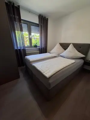 Ein Bett oder Betten in einem Zimmer der Unterkunft Ferienwohnung Roos