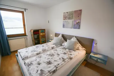 Ein Bett oder Betten in einem Zimmer der Unterkunft Moselblick am Waldrand