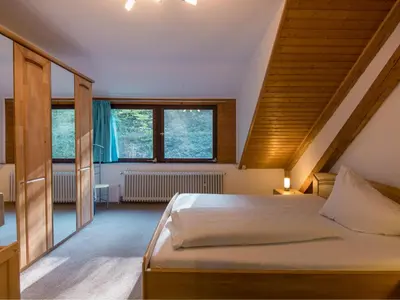 Ein Bett oder Betten in einem Zimmer der Unterkunft Apartment Eifelnatur - Haus 1-3 by Interhome