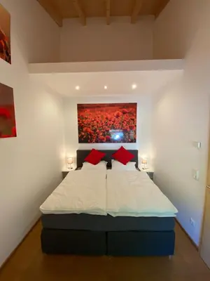 Ein Bett oder Betten in einem Zimmer der Unterkunft Ferienhaus-Heckelmann Diefenbach