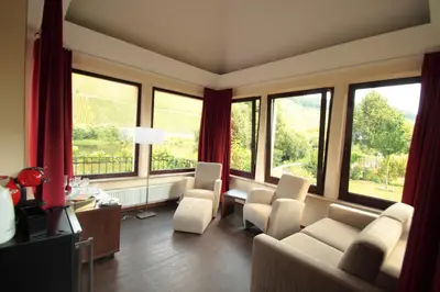 Ein Sitzbereich in der Unterkunft Boutique Hotel Villa Melsheimer