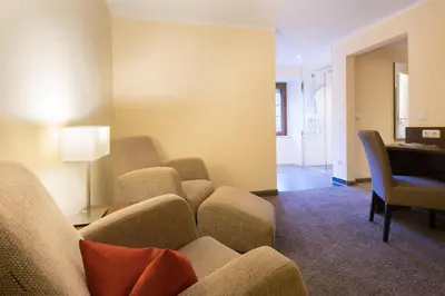 Ein Sitzbereich in der Unterkunft Boutique Hotel Villa Melsheimer