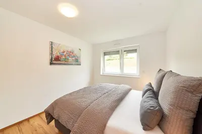Ein Bett oder Betten in einem Zimmer der Unterkunft Reisezeit