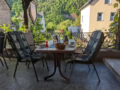 Ein Balkon oder eine Terrasse in der Unterkunft Weingut Pension Hammes-Krüger