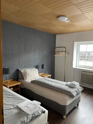 Ein Bett oder Betten in einem Zimmer der Unterkunft The Gantry