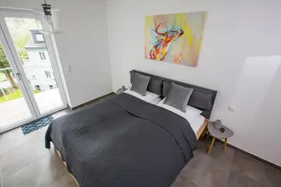 Ein Bett oder Betten in einem Zimmer der Unterkunft Ahr-Palais