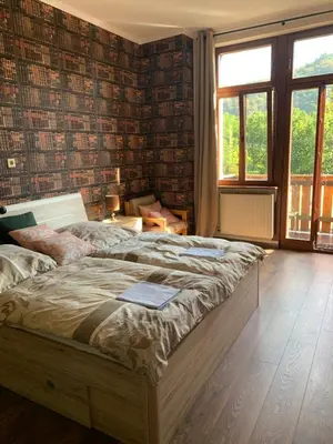 Ein Bett oder Betten in einem Zimmer der Unterkunft Hotelzimmer im alten Reihenhaus auf der Stadtmauer