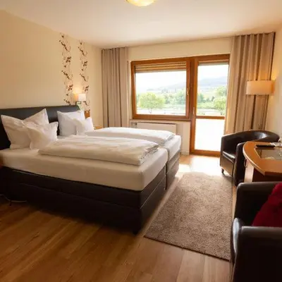 Ein Bett oder Betten in einem Zimmer der Unterkunft Hotel Zehnthof