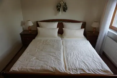 Ein Bett oder Betten in einem Zimmer der Unterkunft Landgasthof “Zur Alten Mühle“