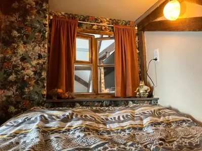 Ein Bett oder Betten in einem Zimmer der Unterkunft Happy Hippo Haus