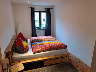 Ein Bett oder Betten in einem Zimmer der Unterkunft Zum Jandel