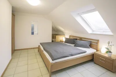 Ein Bett oder Betten in einem Zimmer der Unterkunft Haus Ambros